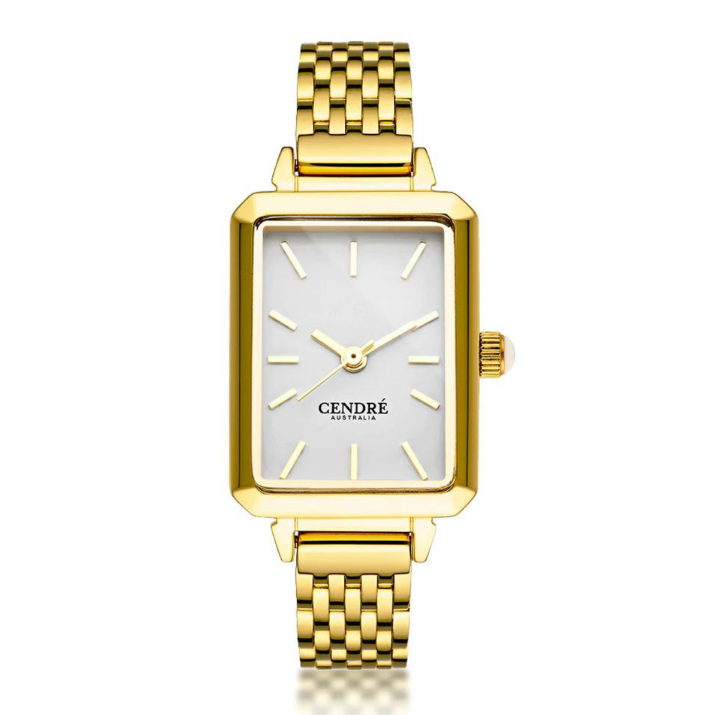 Gold Cendre watch with rectangular dial and white face.